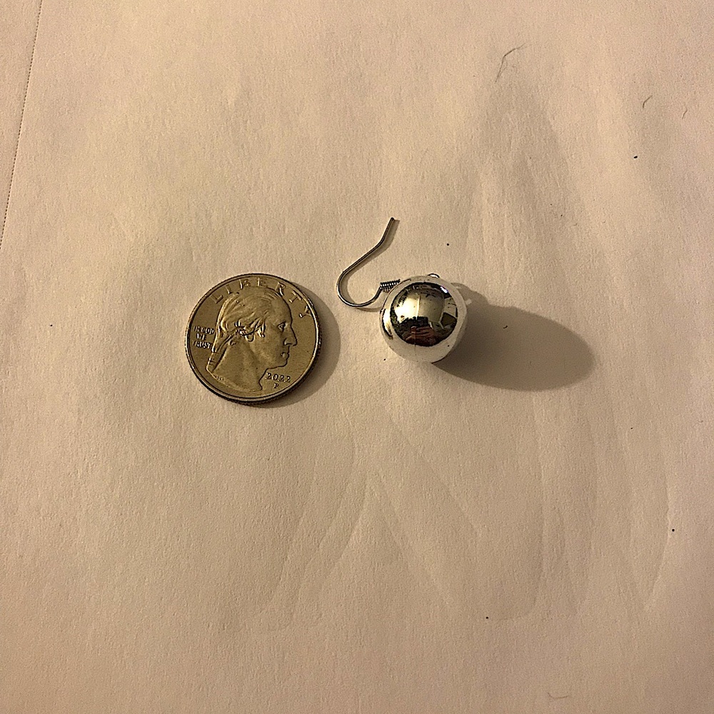 Size compared to a quarter: Ornament Christmas earrings, in different colors.